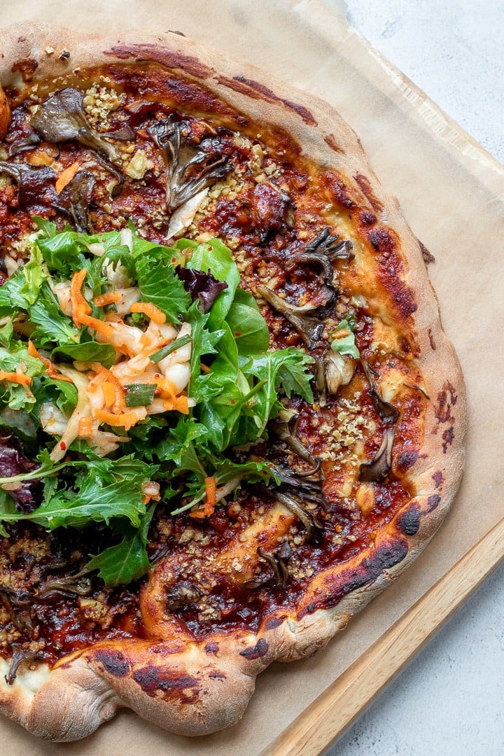 Vegan Korean Barbecue Pizza on a cutting board.