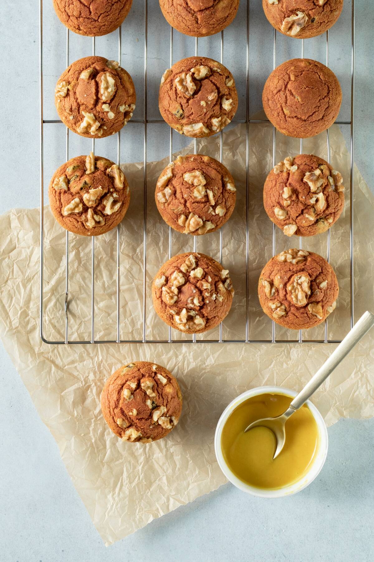 overhead shot of muffins on a cooling rack.