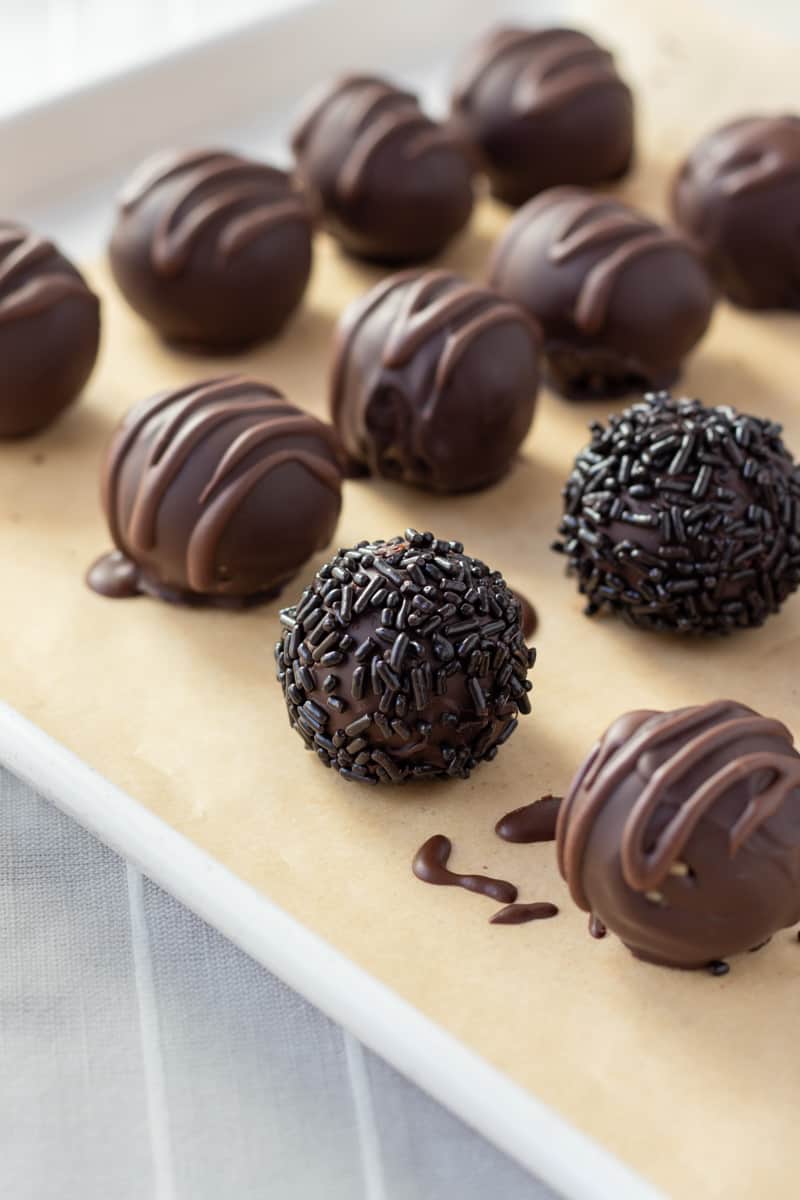 cookie dough bites can be decorated in a variety of ways like sprinkles or with plain cacao powder