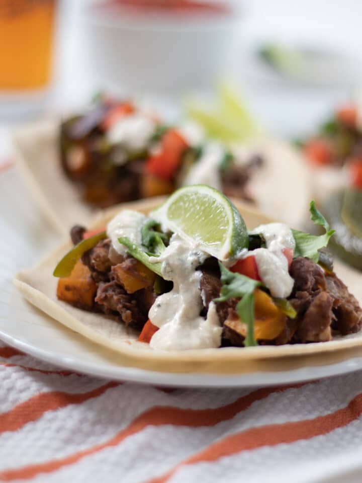 Refried Black Bean and Tempeh Tacos with Creamy Lime Dressing-2
