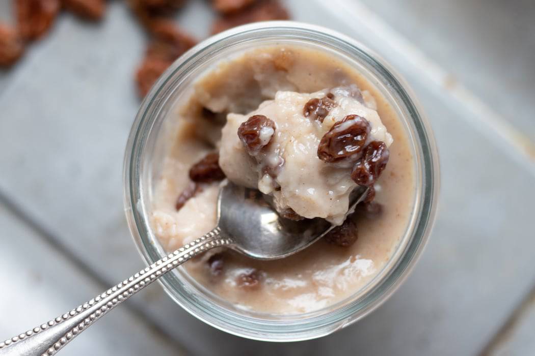 spoon scooping up pudding showing creamy texture