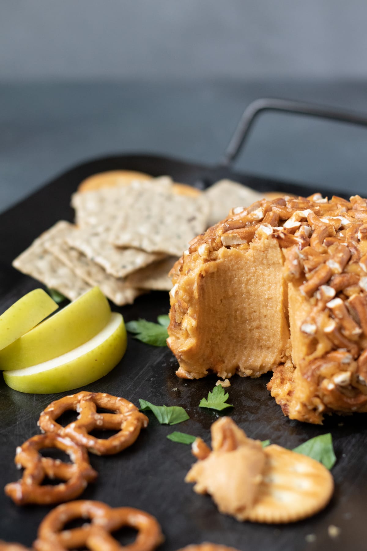 Showing the interior creamy texture of a cheese ball.