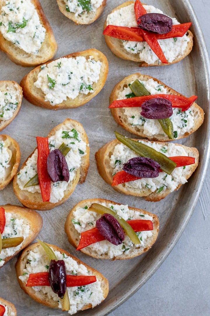 overhead view of crostini on a tray