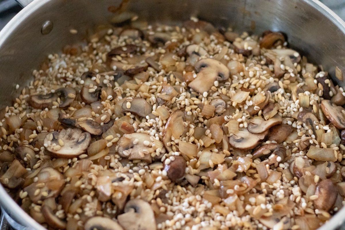 sautéed onion and mushrooms, with the rinsed barley added to the pan