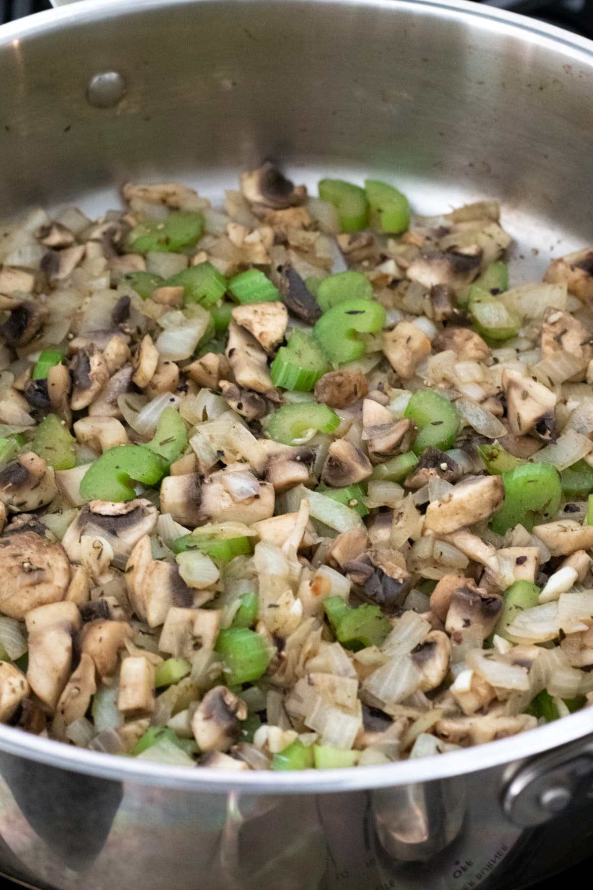 sautéing onion, mushrooms, celery, and herbs.