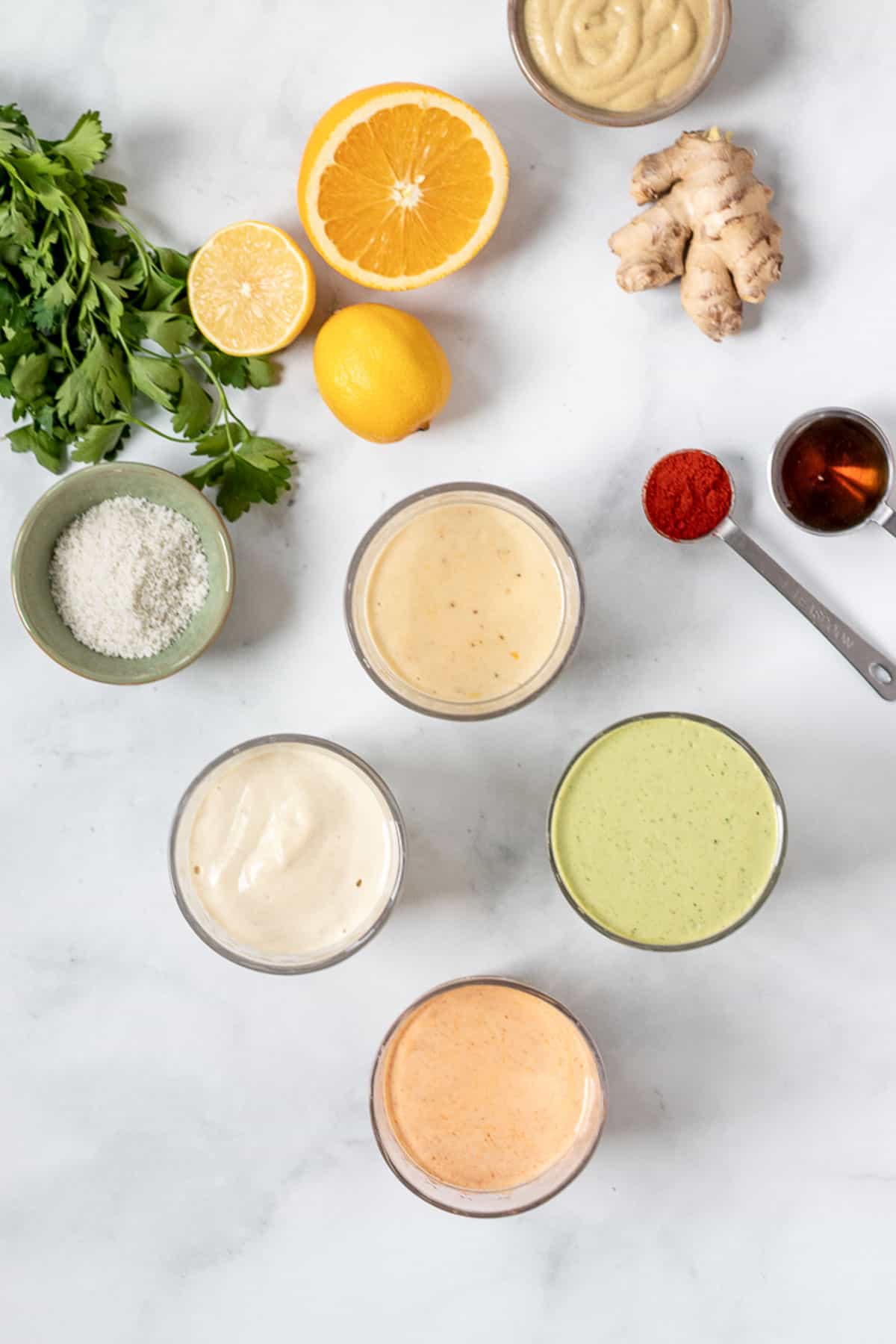 variety of colorful and healthy vegan dressings.