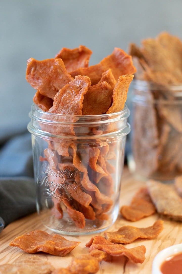 Vegan Sseitan Jerky in a jar, close up of Buffalo flavor