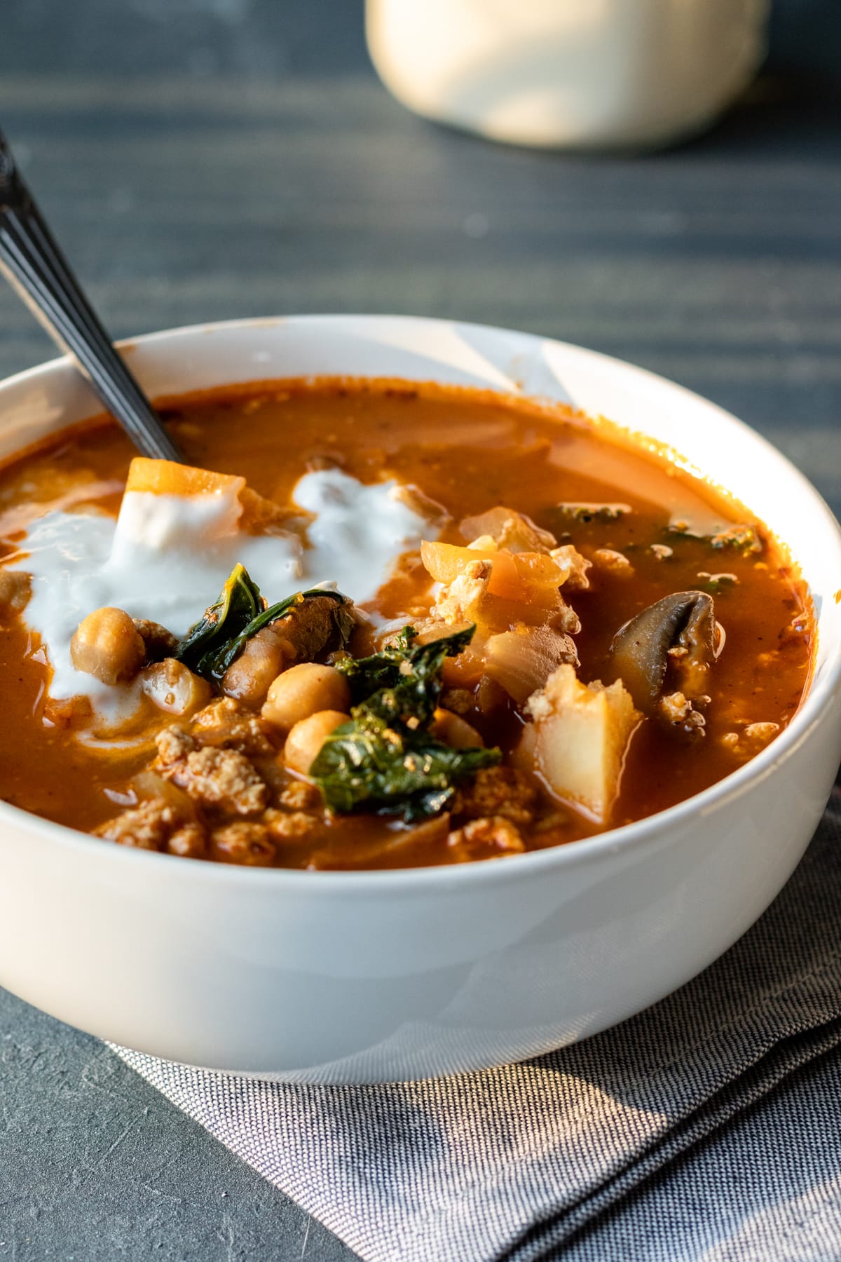 vegan chorizo in a bowl of spicy soup