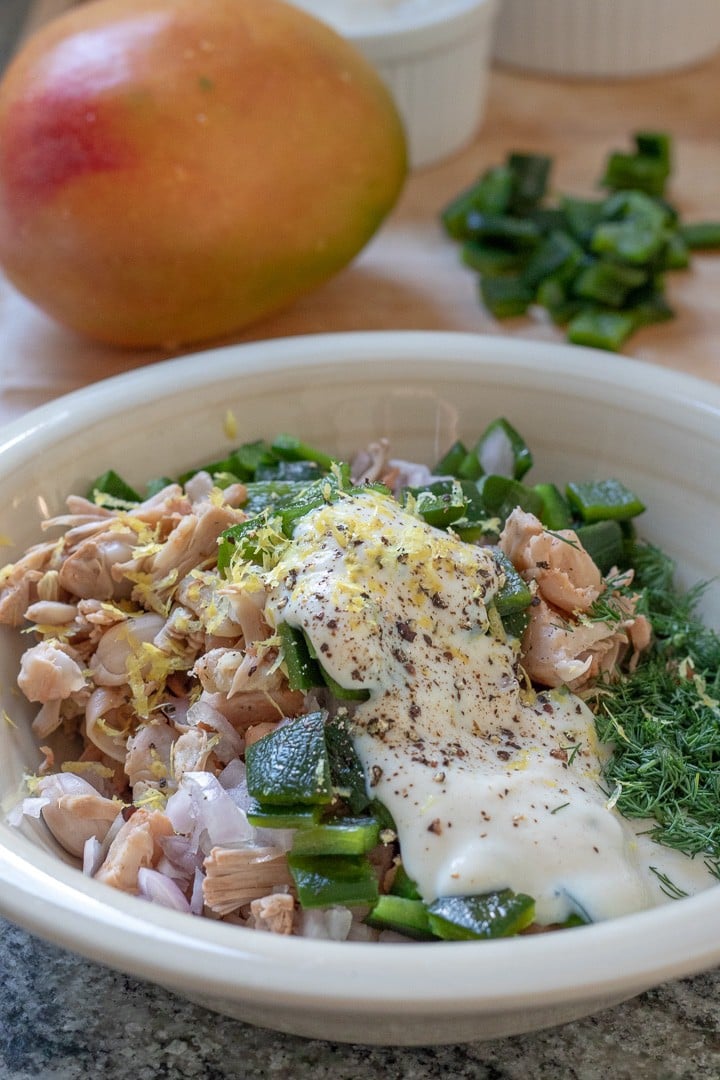 combining ingredients in a bowl.