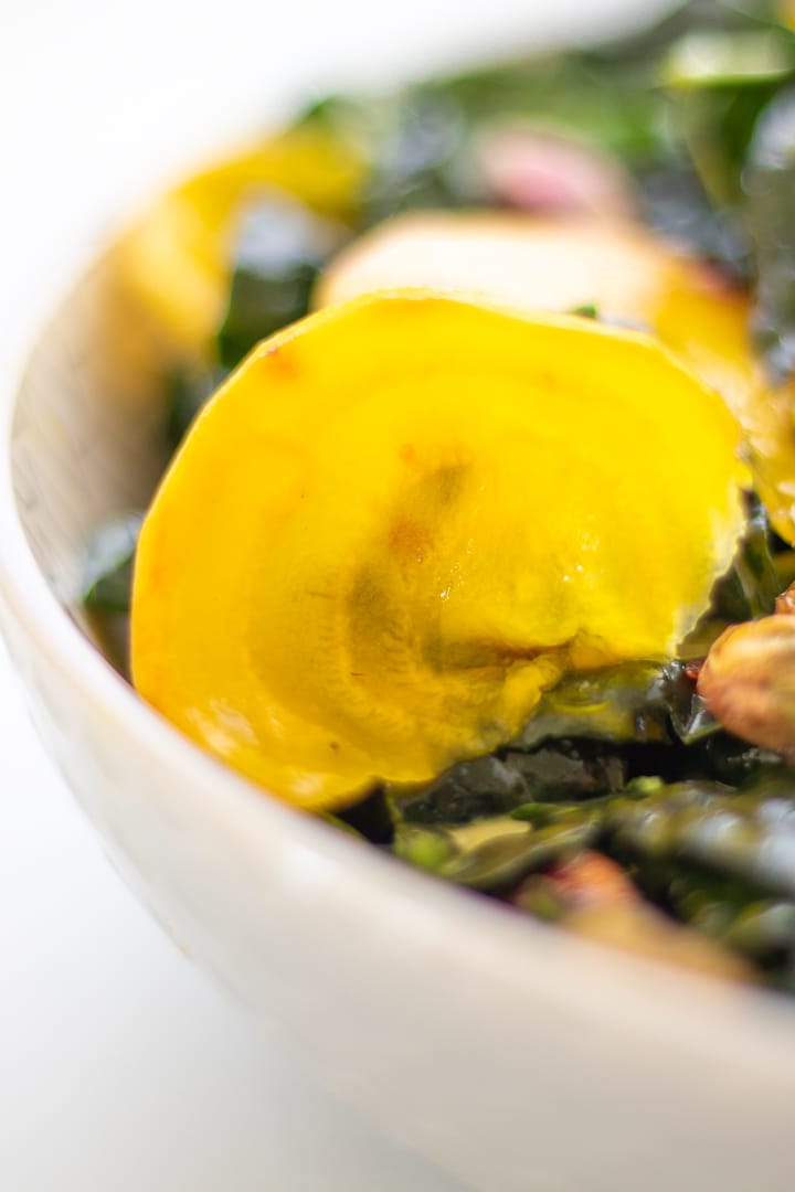 close up of a slice of golden beet with light shining through