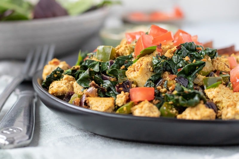 side view of tofu scramble piled up on a plate.