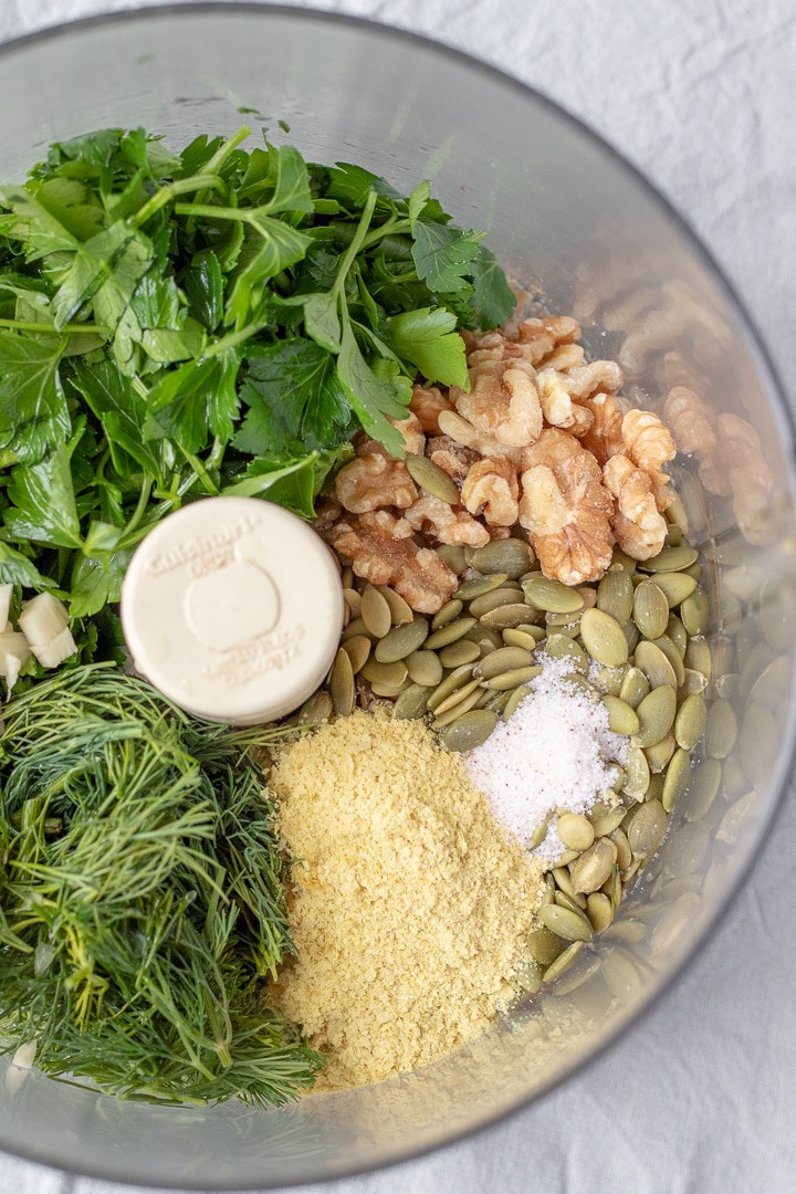 ingredients for Parsley Dill Pesto in a food processor.