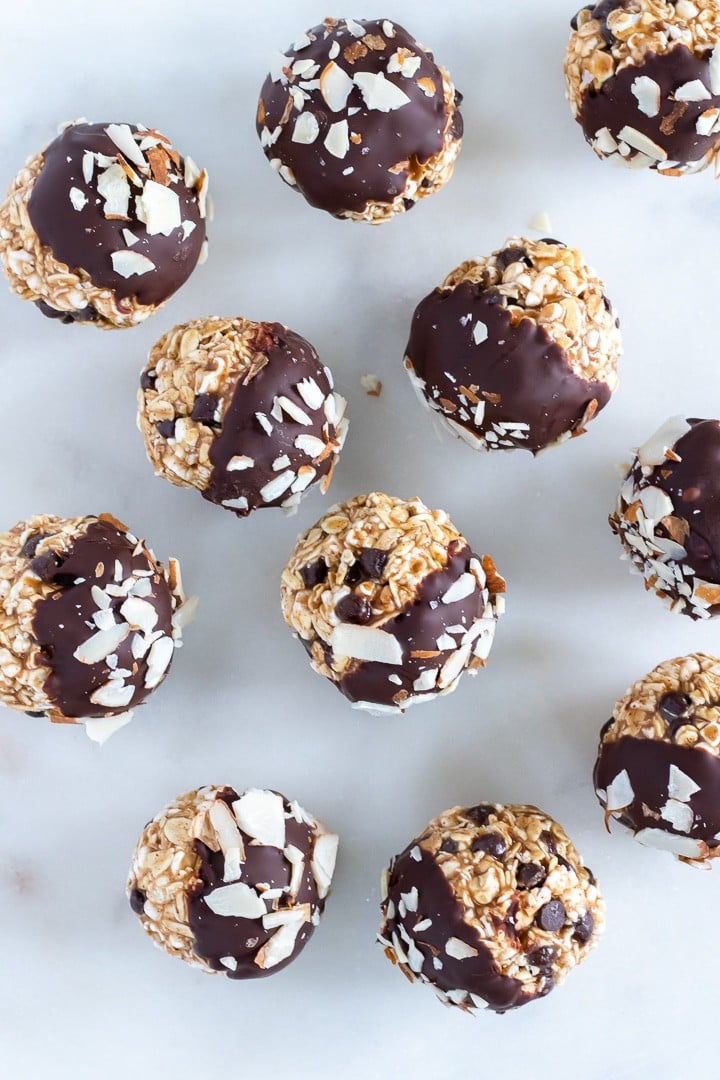 Overhead view of Chocolate-Almond Popped Sorghum Balls on marble.