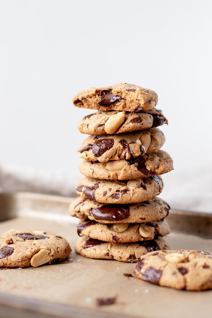 A stack of Spelt Cookies With Peanuts and Chocolate