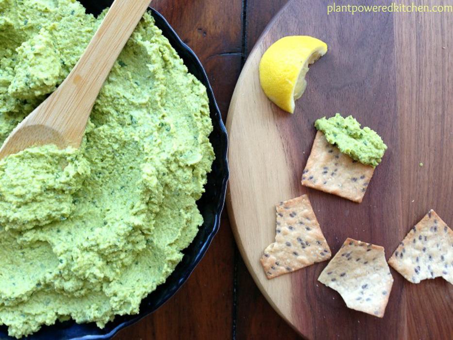 overhead view of green chickpea hummus.