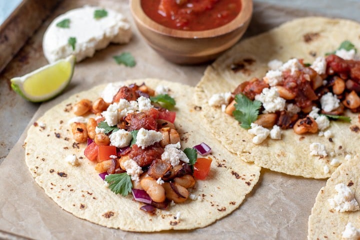 Almond Queso Fresco crumbled onto tacos.