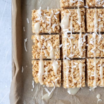 overhead shot of CBD-Infused Vegan Rice Krispie Treats on a parchment-lined pan