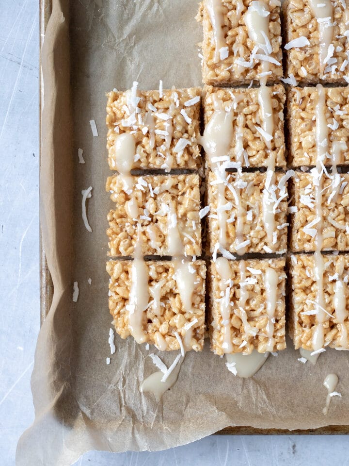 overhead shot of CBD-Infused Vegan Rice Krispie Treats on a parchment-lined pan