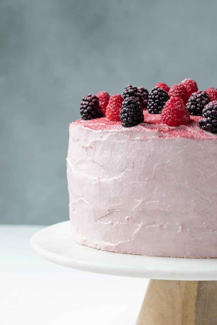 side view of Vegan Chocolate Cake on a cake stand