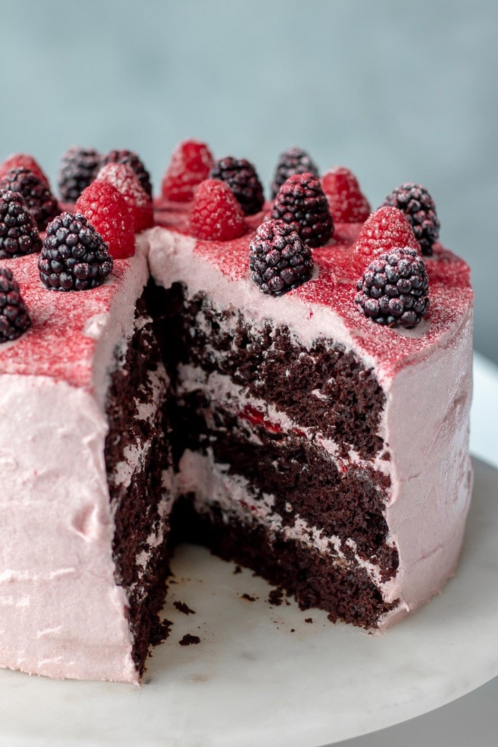 inside view of vegan chocolate cake with a slice removed