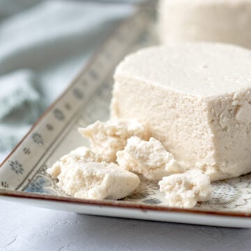 crumbled almond cheese on a platter