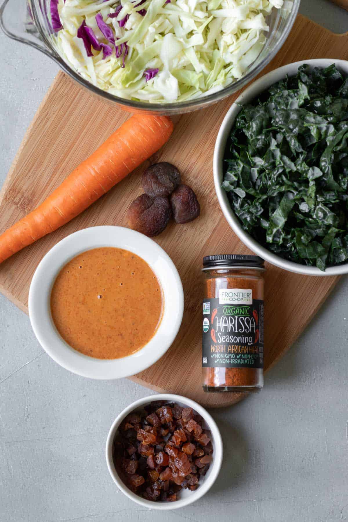 ingredients for kale slaw with harissa dressing.