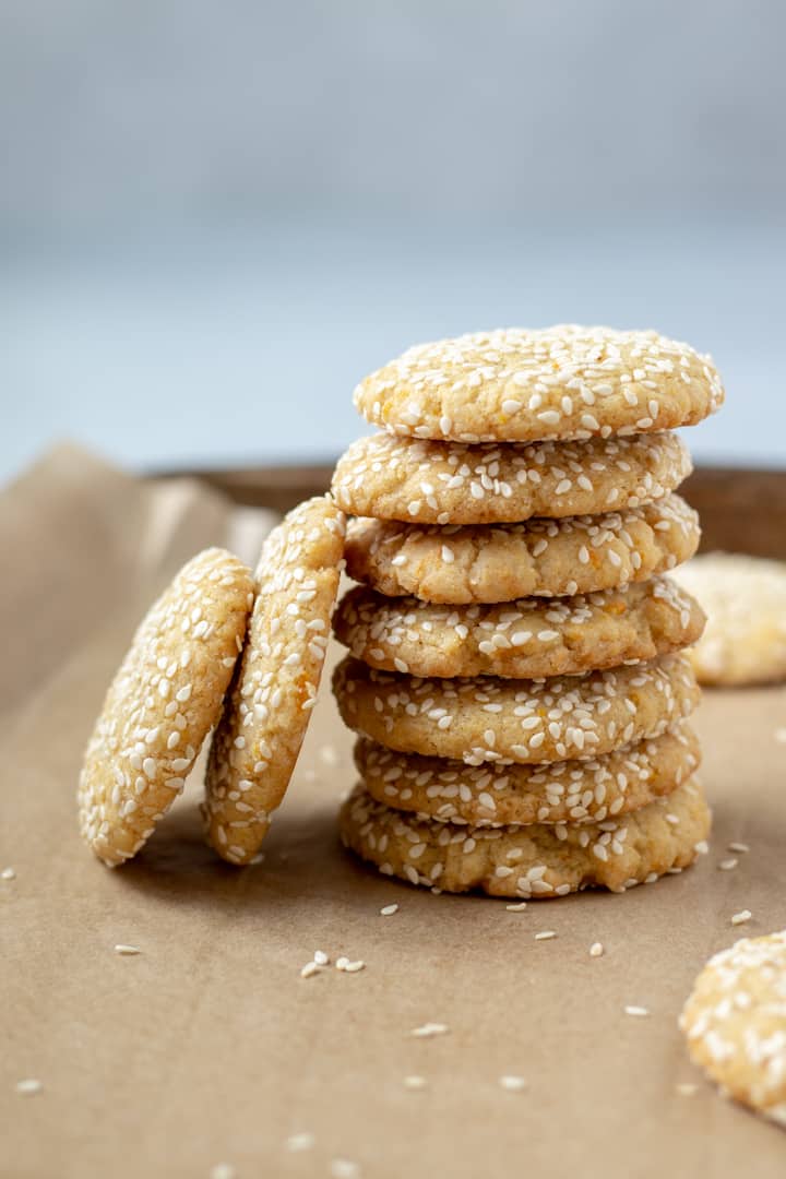 a stack of Tahini Cookies on a baking sheet