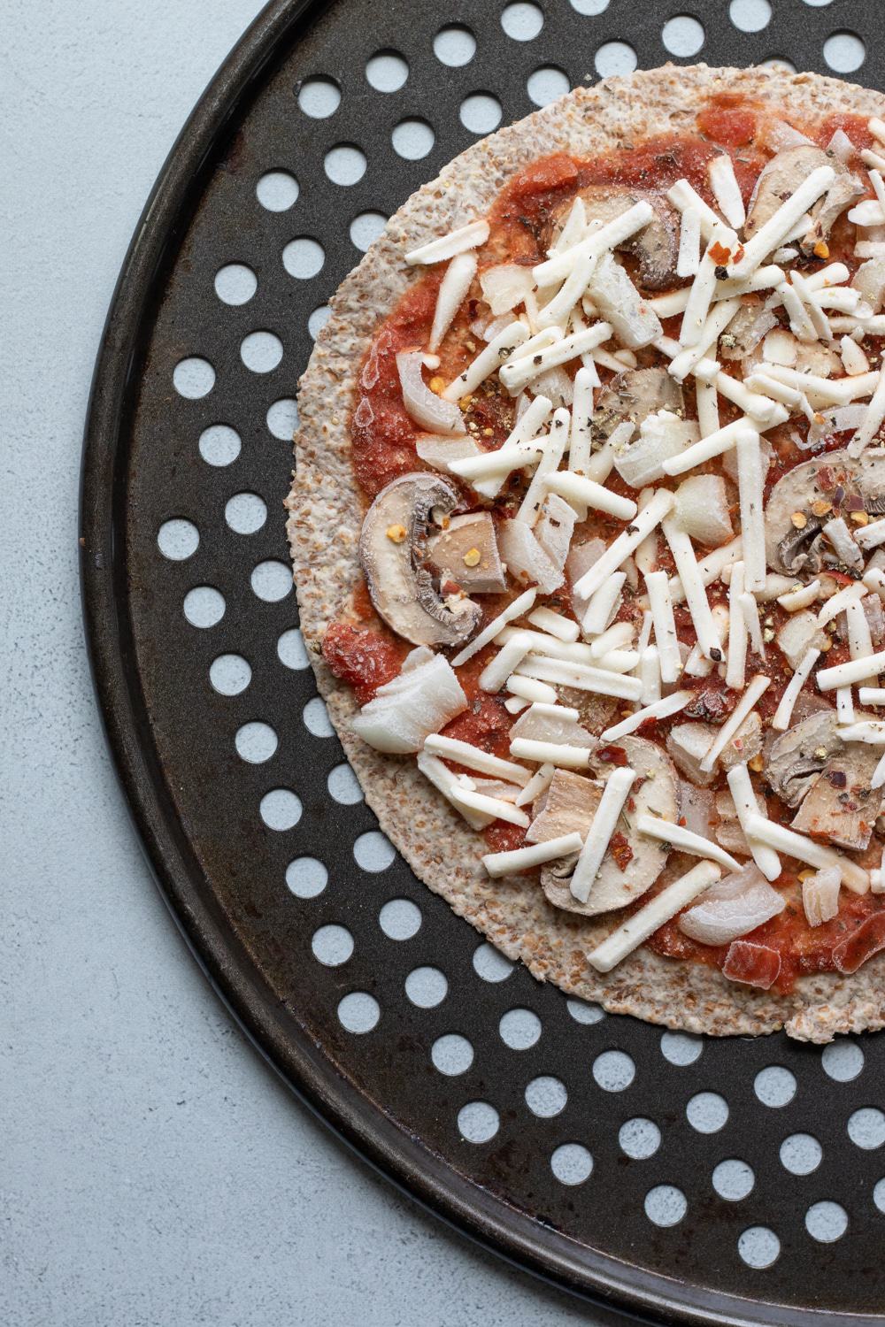 frozen pizza on a baking sheet