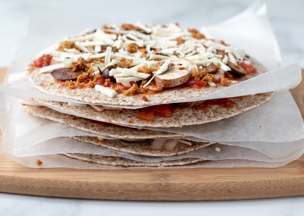 a stack of tortilla pizzas