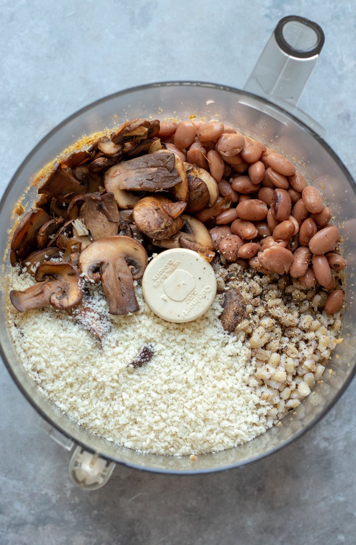 ingredients for mushroom-barley burgers in a food processor.