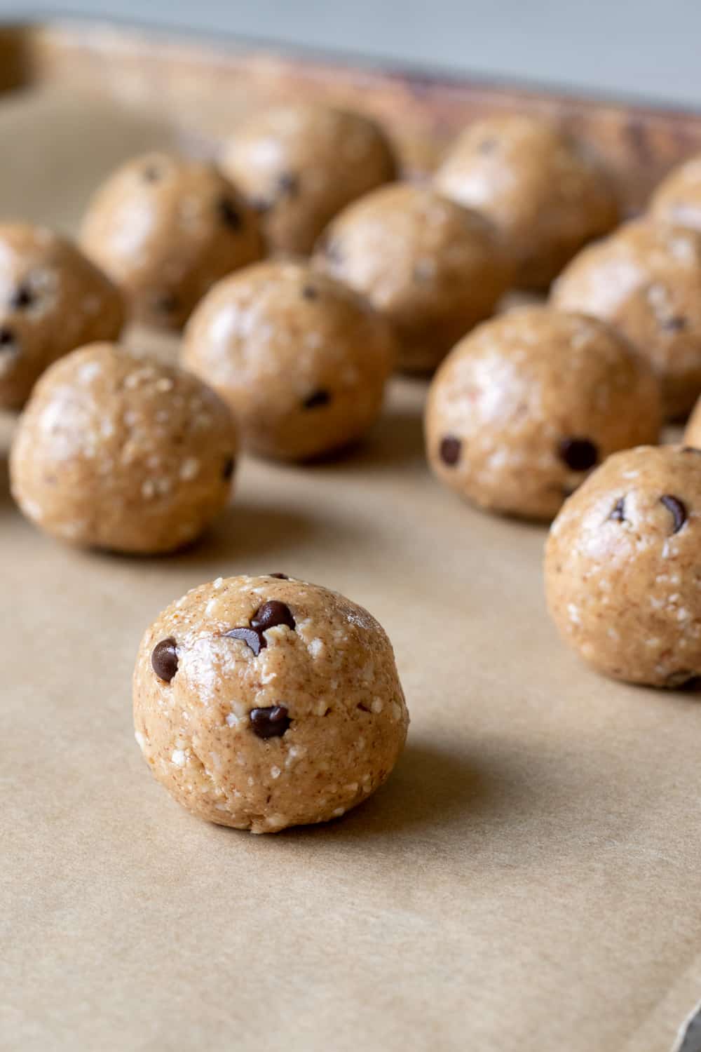 vegan protein balls on parchment paper.