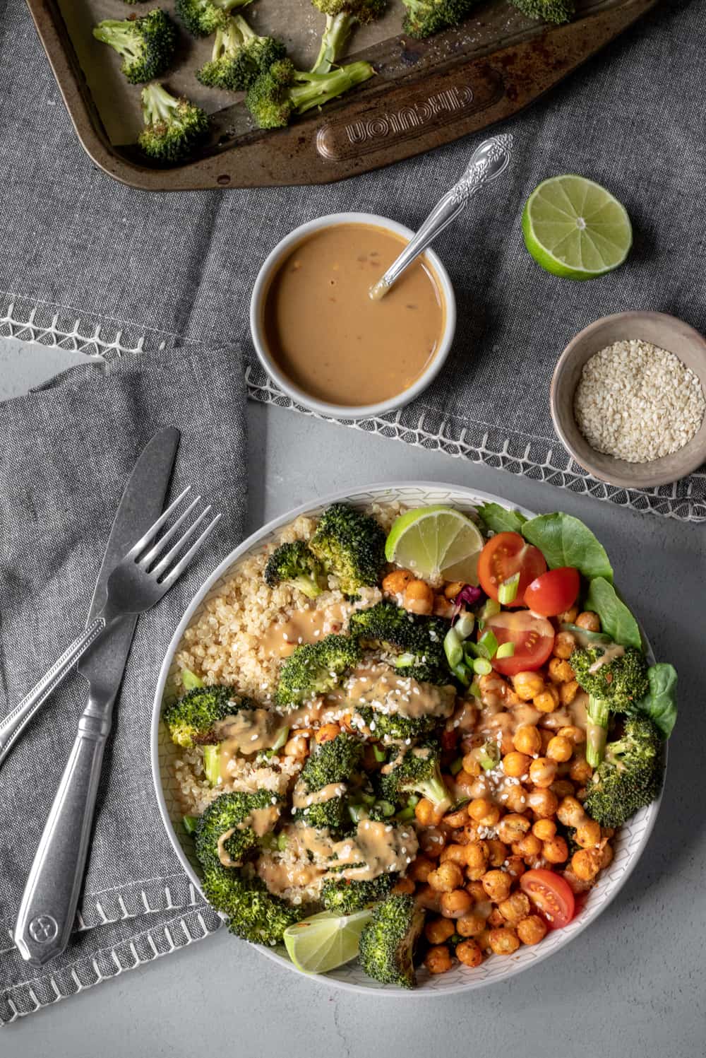 overhead shot of Roasted Broccoli Bowl with condiments on the side.