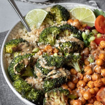 close up of Roasted Broccoli Bowl drizzled with Sunbutter Sauce