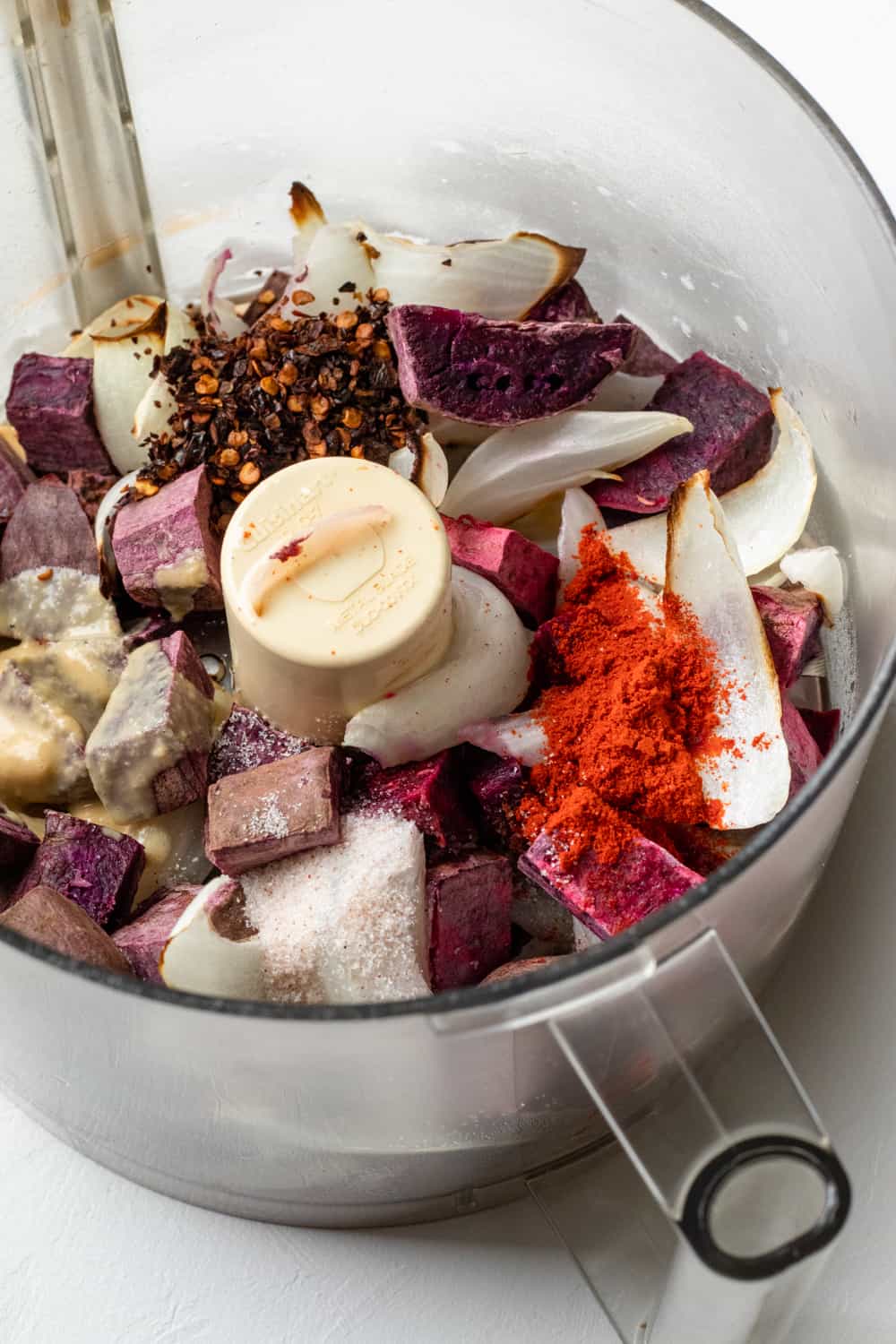 ingredients for purple sweet potato dip in food processor bowl.