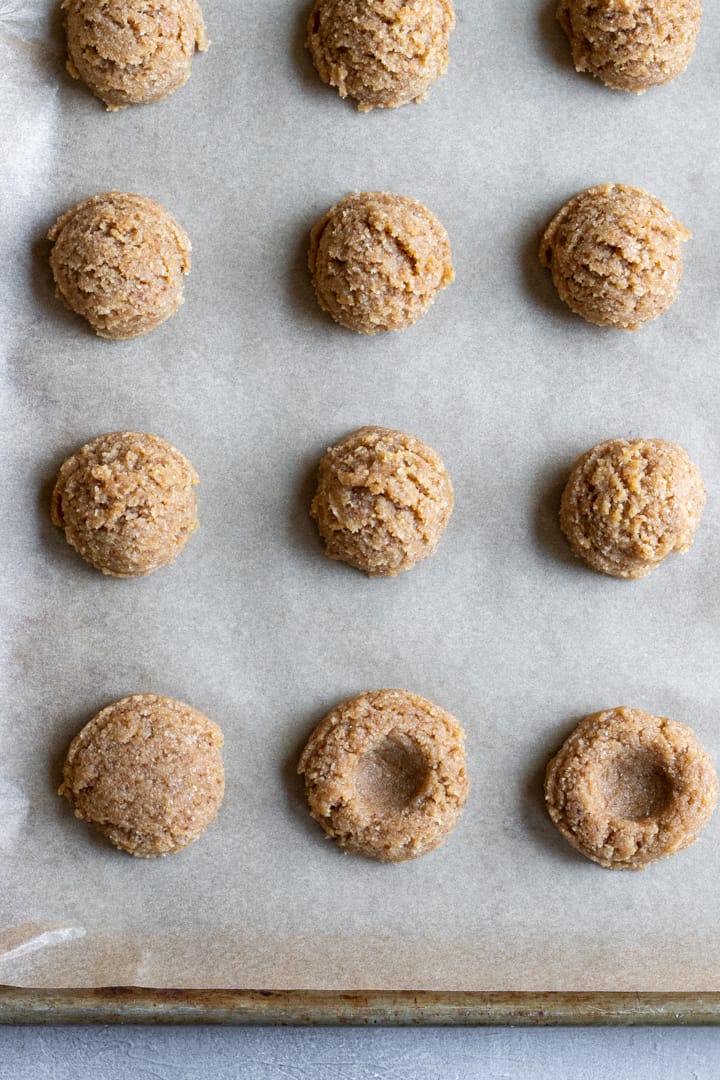 unbaked cookie dough on baking sheet.