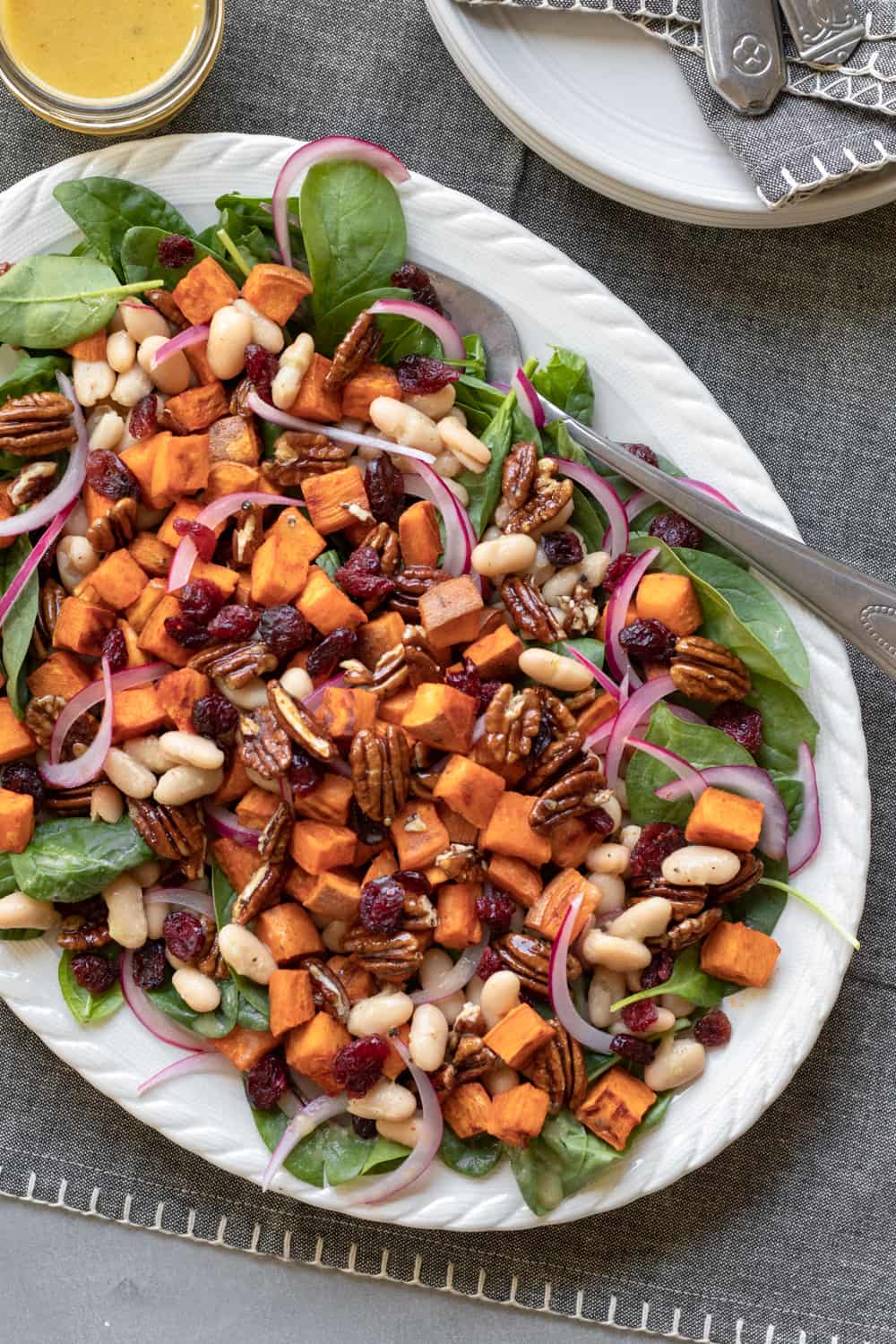 overhead shot of sweet potato salad on a serving platter.