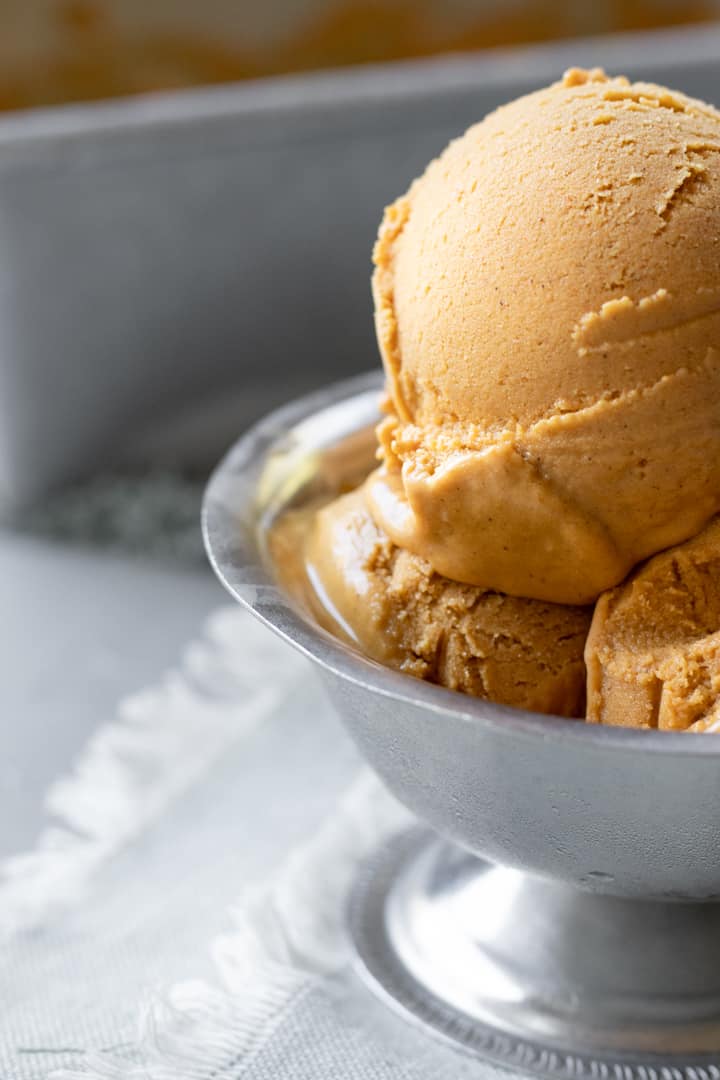 a close up of pumpkin oat ice cream in a dish.