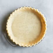 overhead view of crimped unbaked crust in a pie plate.