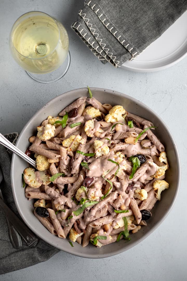 vegan kalamata olive pasta in a large bowl.