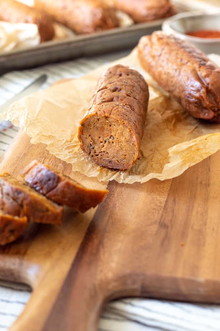 view of the inside of a sliced vegan sausage link.