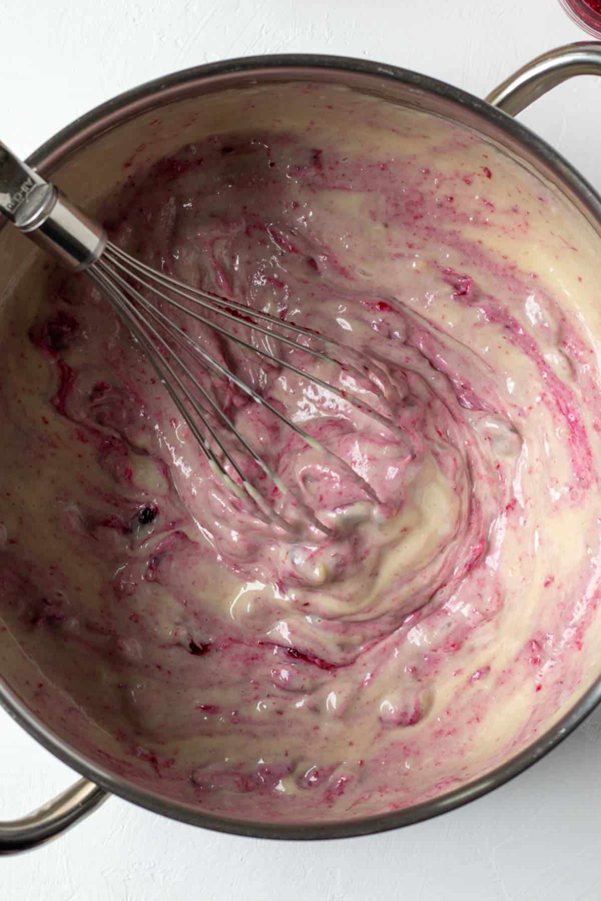 whisking cranberry sauce into the pie filling.