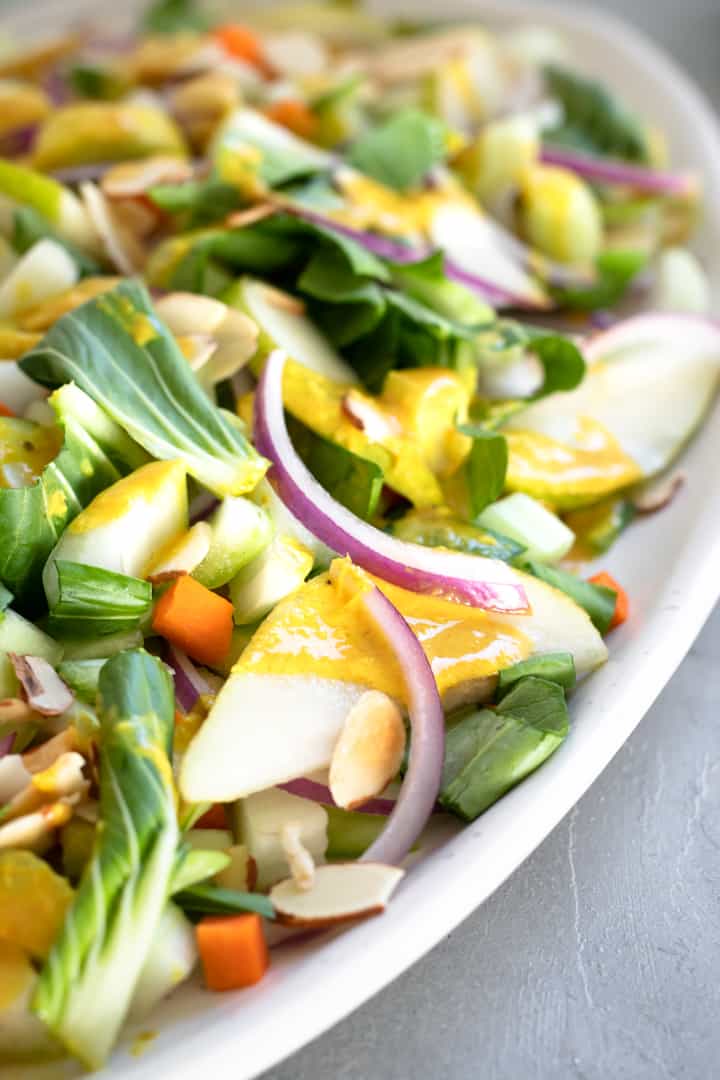 close up of bok choy salad with ginger-turmeric dressing.