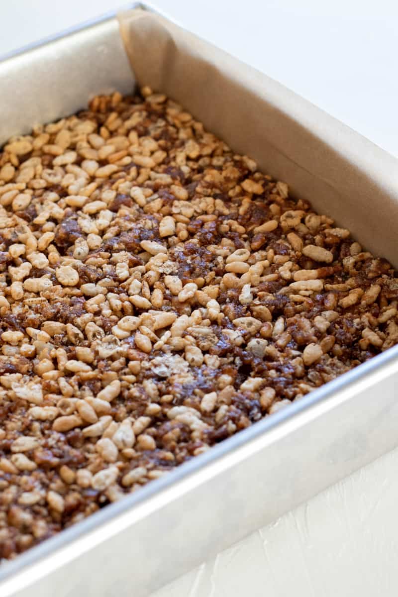 square pan filled with date rice crispy treats.
