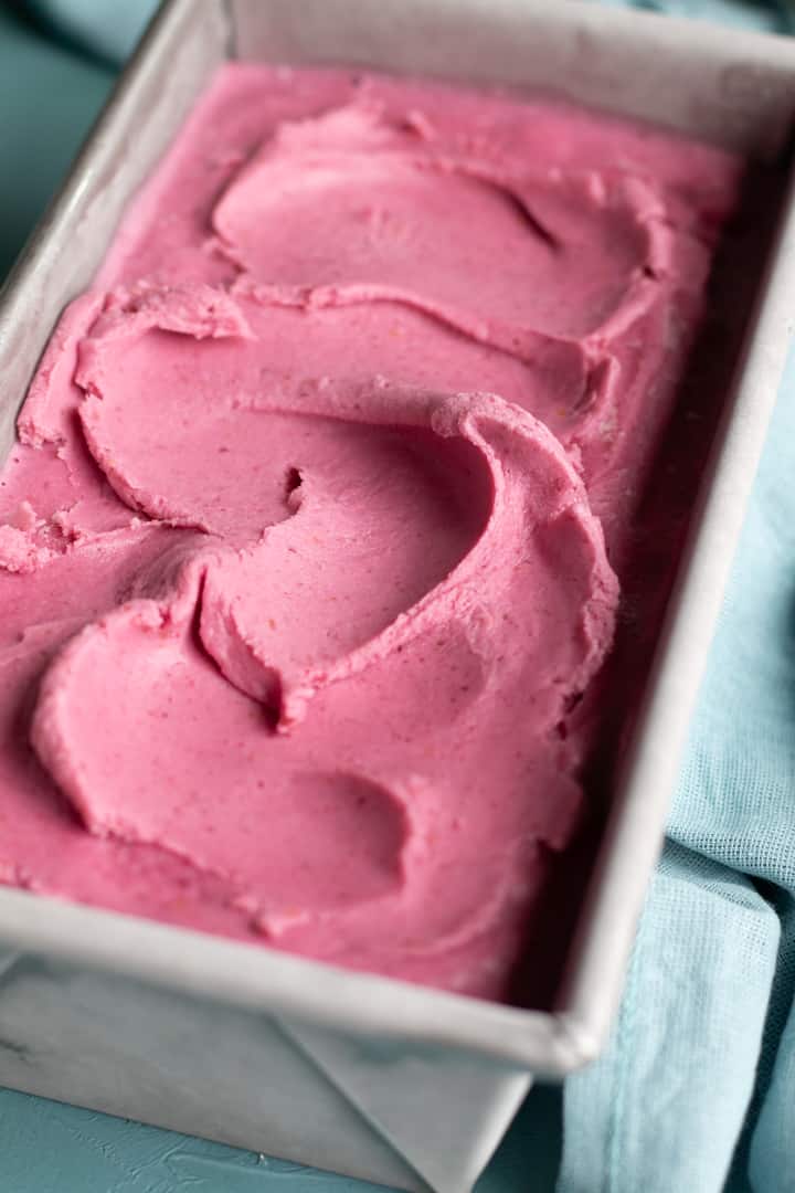 cranberry oat ice cream in a loaf pan straight out of the freezer.