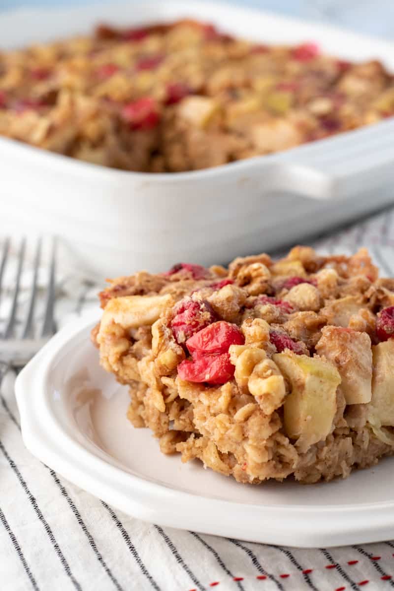 a serving of apple baked oatmeal on a plate.