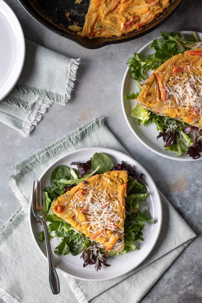 overhead shot of Hash Brown-Crusted Frittata served on a bed of lettuce