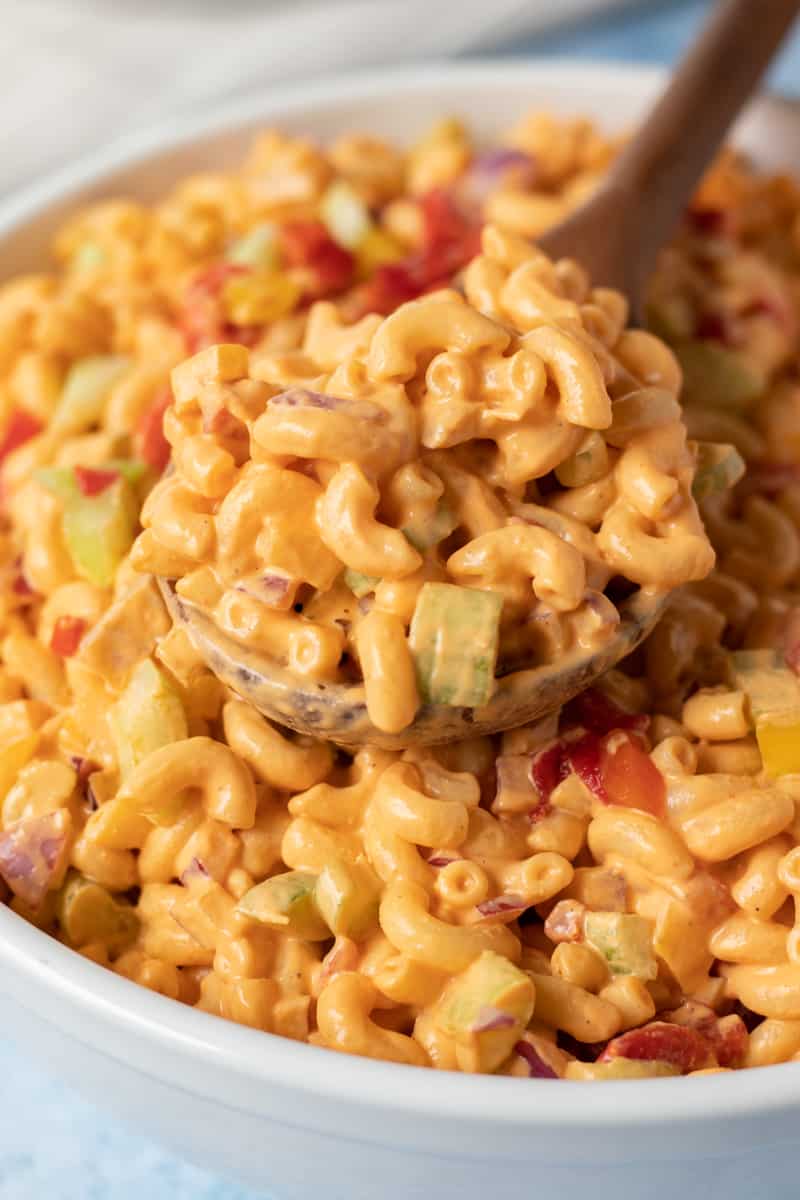 close up of healthy macaroni salad showing creamy sauce without mayo.