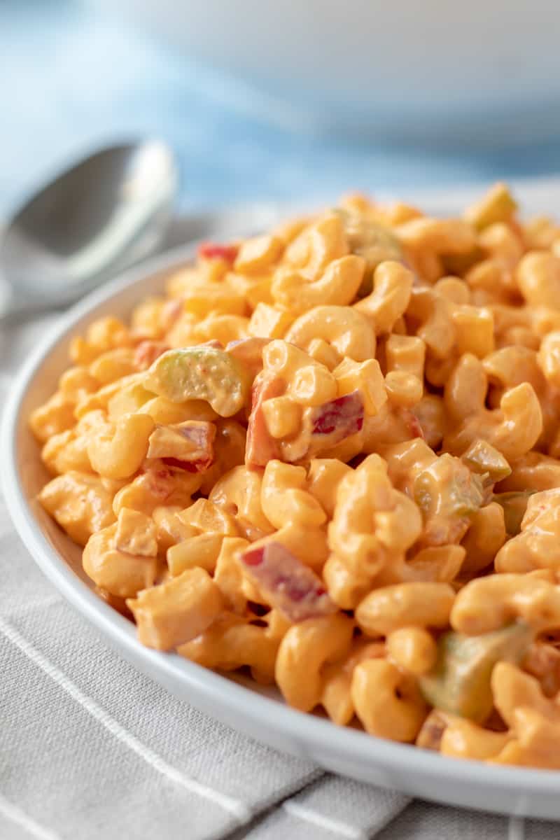 a serving of vegan macaroni salad on a plate.