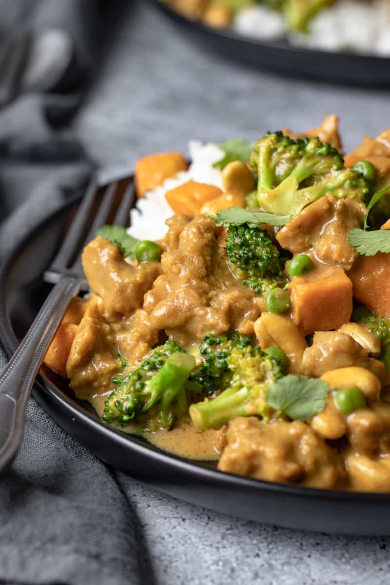 curried seitan plated with rice.