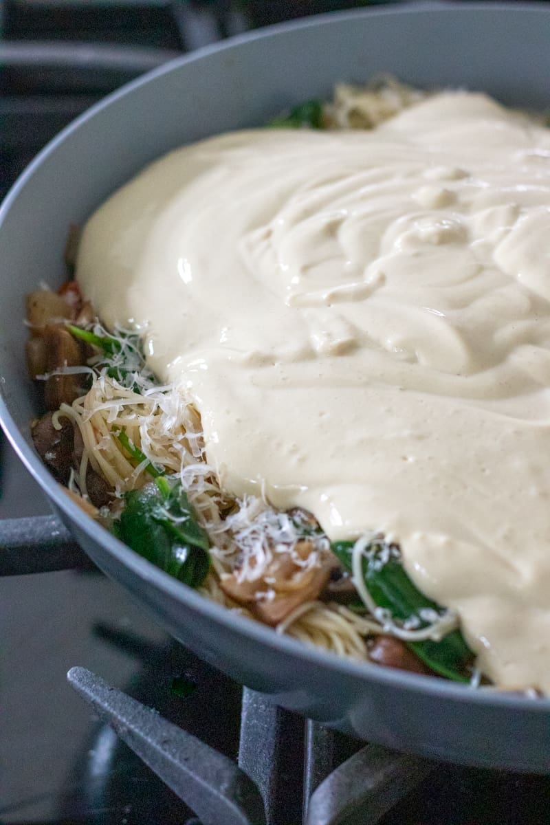 pouring tofu mixture into pan